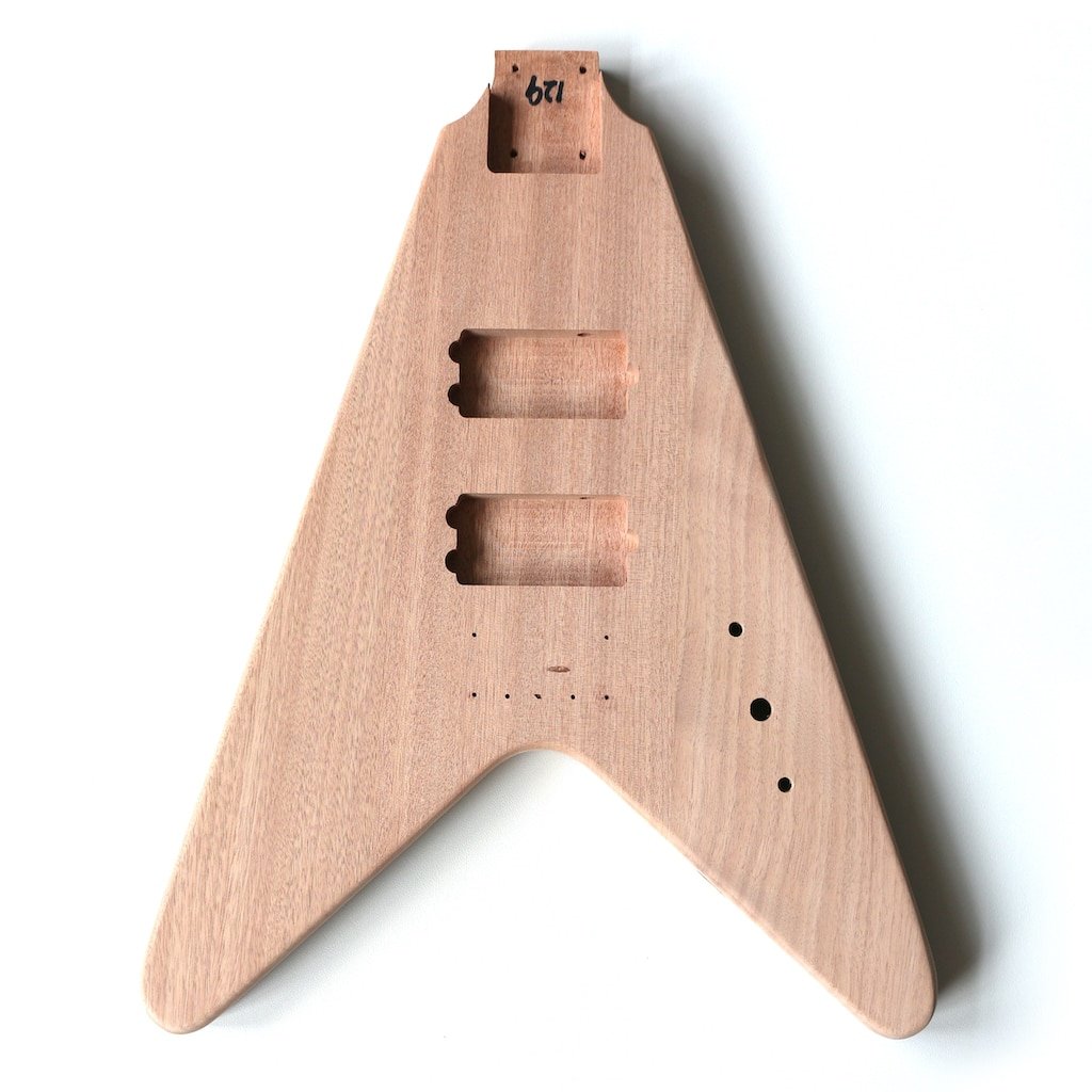 FV Bass chrome (4) a wooden guitar body with holes