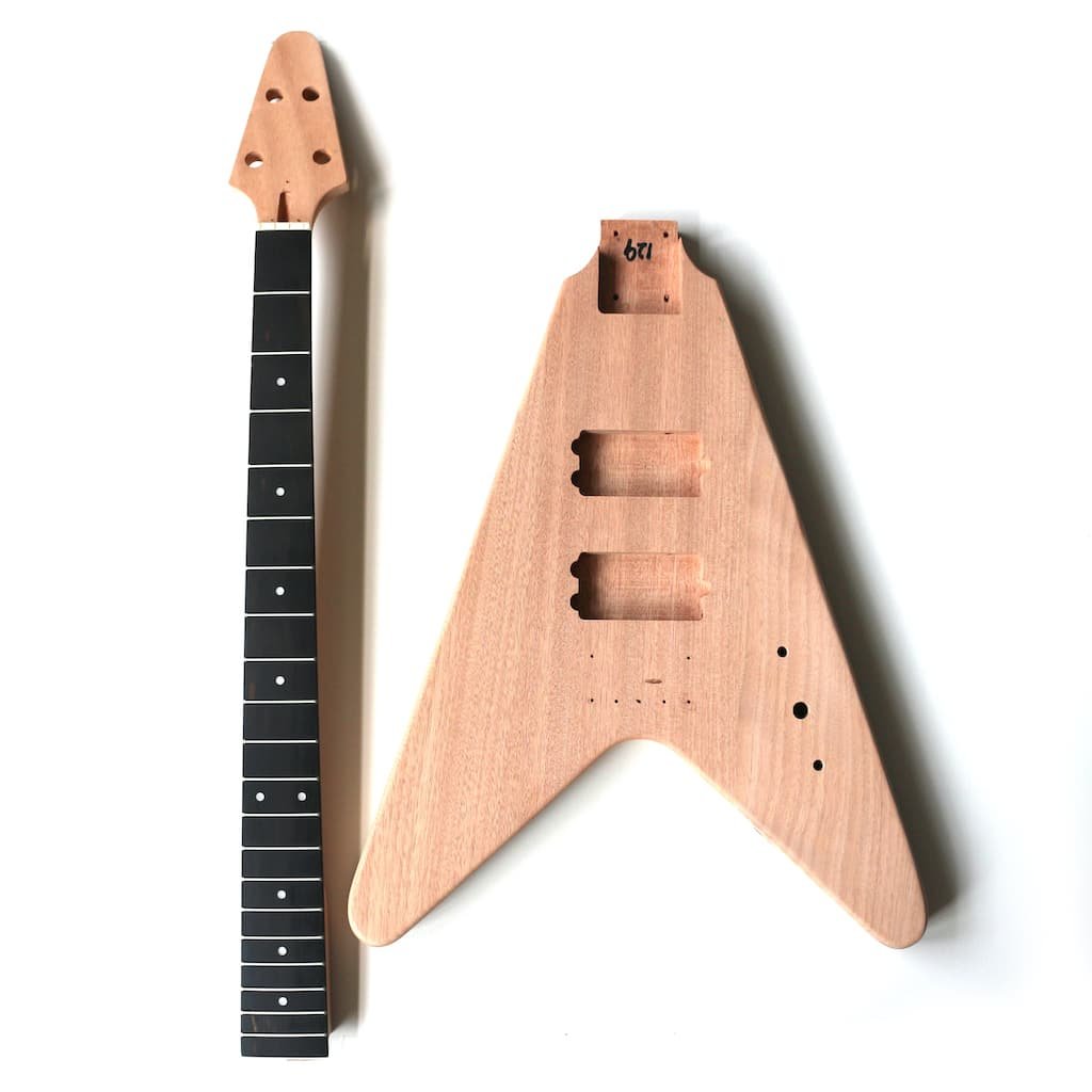 FV Bass chrome (6) a wooden guitar neck and a black guitar neck