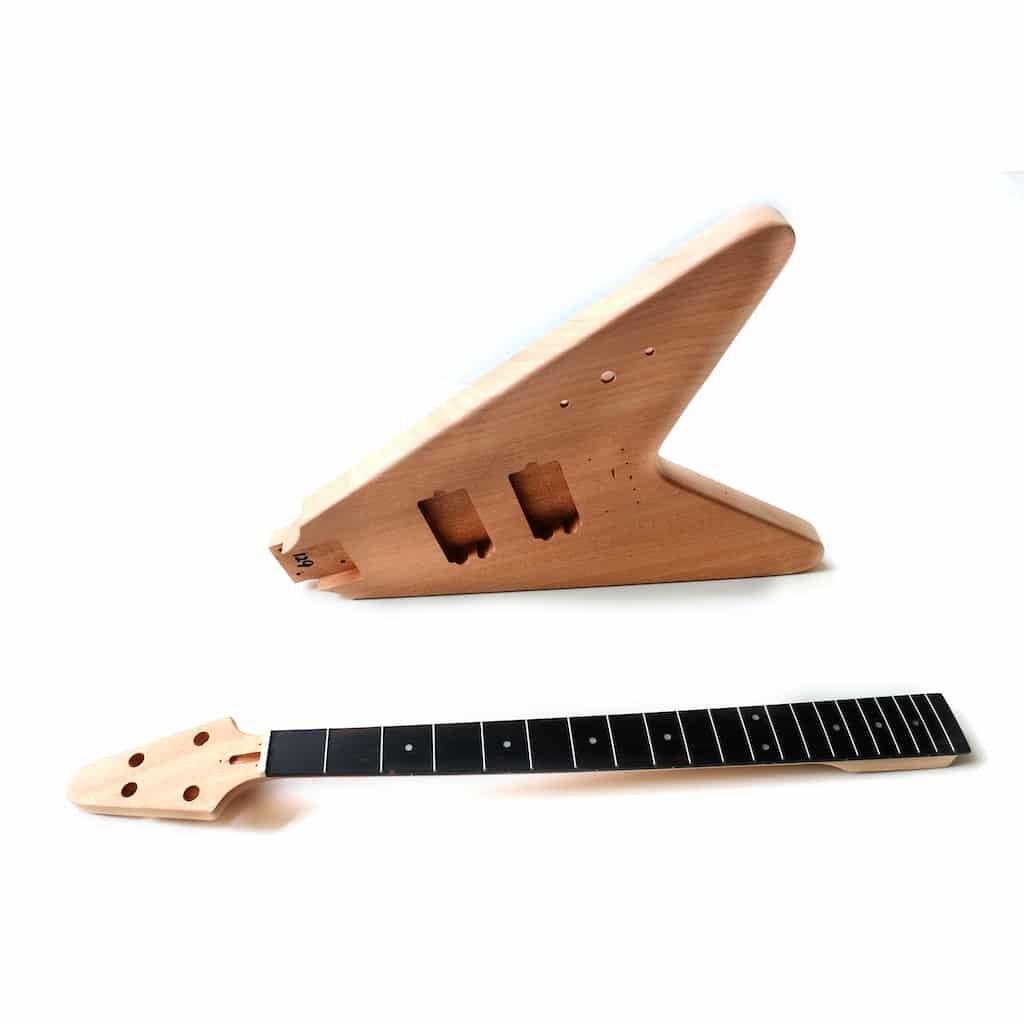 FV Bass chrome (7) a wooden guitar neck and a guitar neck